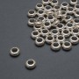 Pandora Bead Findings, diameter 7×3 mm, hole diameter 3.7 mm, packaging 20 g, 52 pcs. (±)