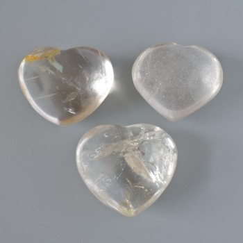 (per 100 g.)"Heart" Mountain Crystal natural souvenir stone, diameter assortment 36x27 mm +/- from 25 g