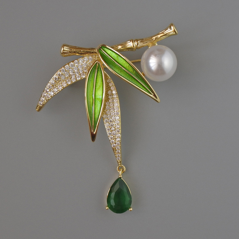 Brooch Leaves with green crystal and enamel, white crystals and bead 49x44 mm, gold-tone metal
