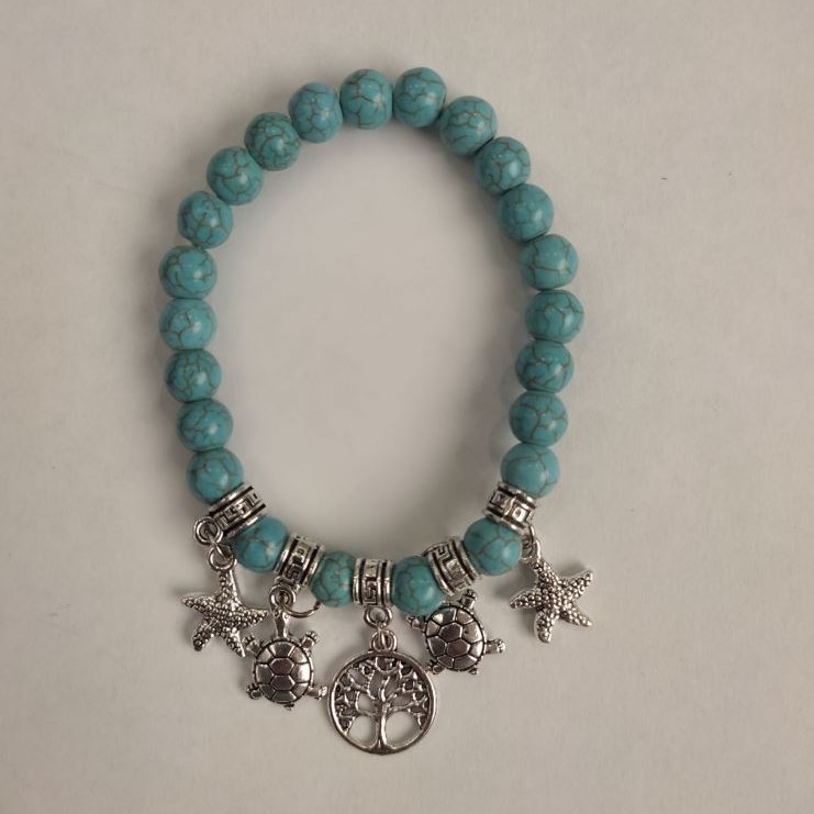 Turquoise Bracelet (named) Smooth Bead, 8 mm diameter ± with Silver Inserts, length 18 cm ± (stretch)