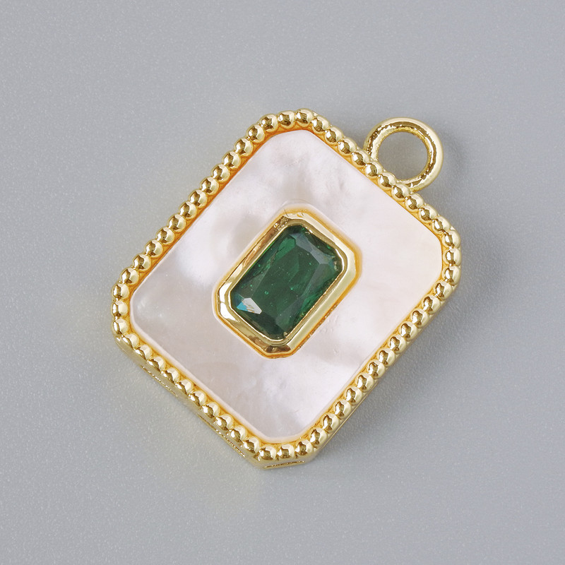 Pendant with mother-of-pearl and green crystal, golden-toned metal, diameter 20×14 mm