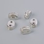Separator bead for two strands with white crystals, silver-colored metal finish, diameter 8x3 mm, 1 pc