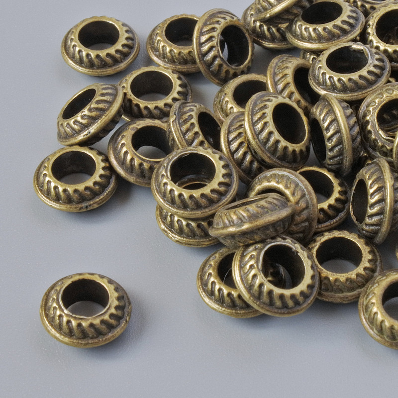 Bronze-colored bead-insert findings, 7.5×3 mm, hole diameter 3.7 mm, pack of 50