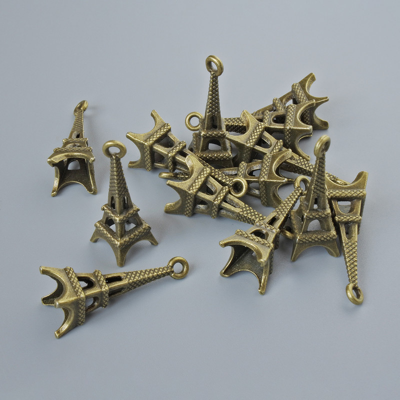 Pendant findings 'Eiffel Tower', size 20x9 mm, hole diameter 1.5 mm, pack of 15 pcs ± bronze-colored metal
