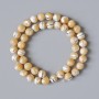 Beige natural pearl beads, smooth round spheres, 8.5 mm diameter, 39 cm length on monofilament