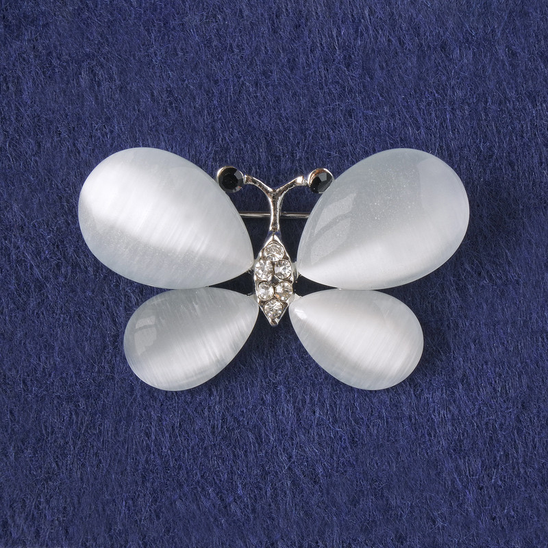Butterfly Brooch with white cat's eye, white crystals, silvery metal 25x38mm+