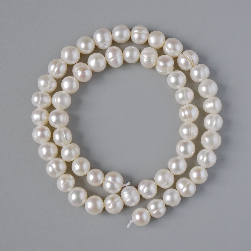 Textured freshwater pearls on thread, 7 mm diameter, 36 cm length