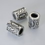 Bead finding 'Nordic rune', diameter 13x10 mm +/-, hole diameter 6 mm, silvery metal color, 1 pc
