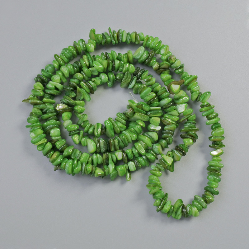 Beads, tinted green mother-of-pearl, chip shape, 7x2.5 mm, 80 cm length on fishing line