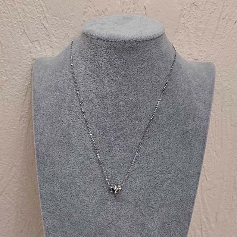 Pendant with three rings, 7 mm diameter, 41–45 cm length, 1.35 mm thickness, silver-toned metal