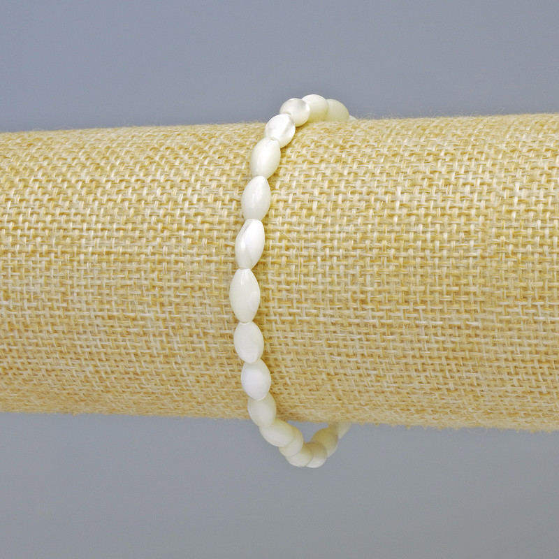 Bracelet with natural mother-of-pearl beads, 5x8 mm diameter, +/- (stretch), length 18 cm+