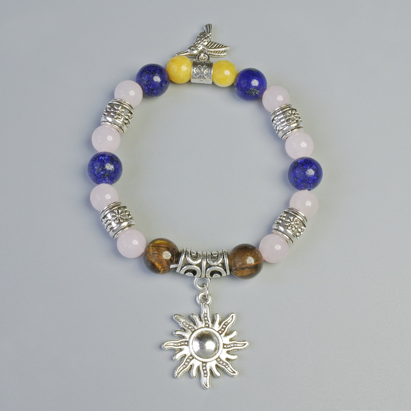 Bracelet with Assorted Smooth Beads, 8.5 mm and 10 mm diameters, stretch, length 18 cm +/- with metal inserts