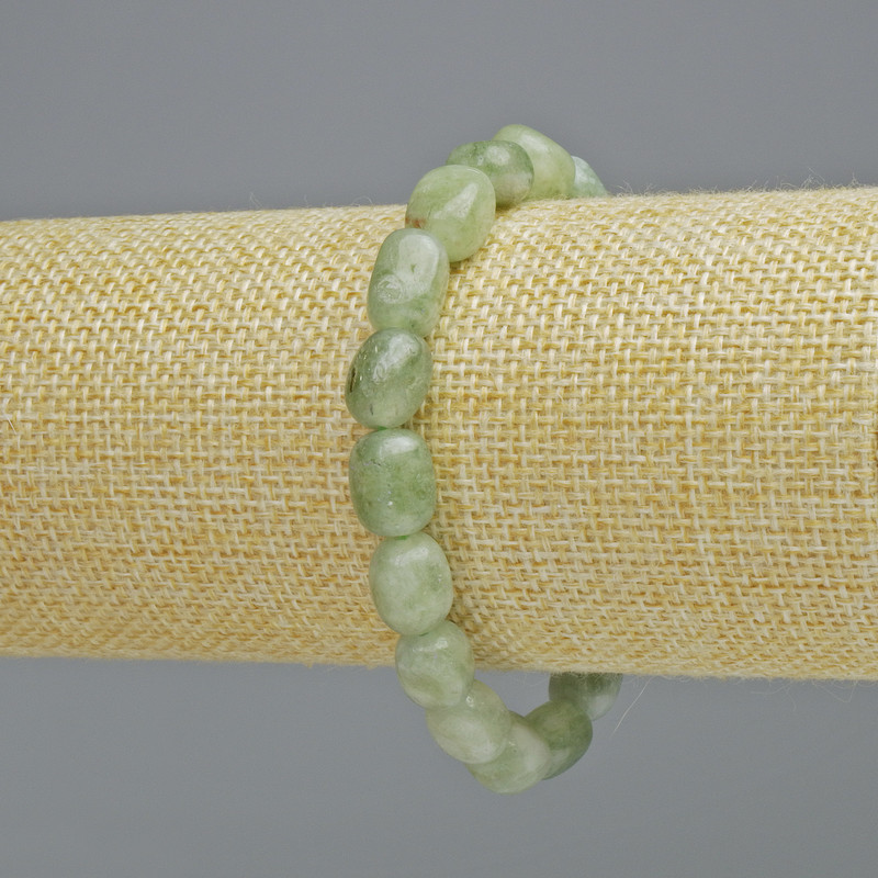 Jadeite natural stone bracelet with faceted beads, diameter 7x11 mm ± (stretch), length 18 cm+