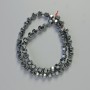 Hematite dumbbell beads, black color, diameter 15×6 mm (+/-), strand length 40 cm (+/-)