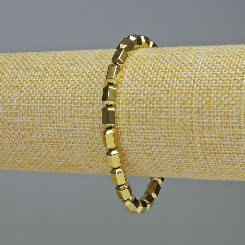 Hematite bracelet with hexagons in gold color, diameter 5x8 mm, length 18 cm, stretch