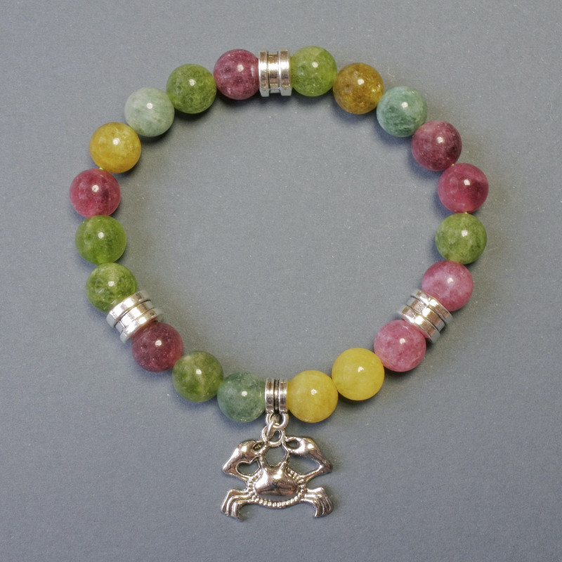 Bracelet with natural tourmaline, smooth bead, diameter 8.5 mm ±, with metal inlays, length 18 cm ± stretch