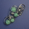 Brooch with Nephrite and Gray Crystals