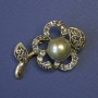 Brooch: Flower with gray pearl and rhinestones, 48×30 mm, gold-toned metal