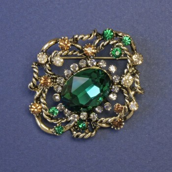Accent Brooch with a Large Green Crystal and Crystals, 44x38 mm ± Gold-Tone Metal