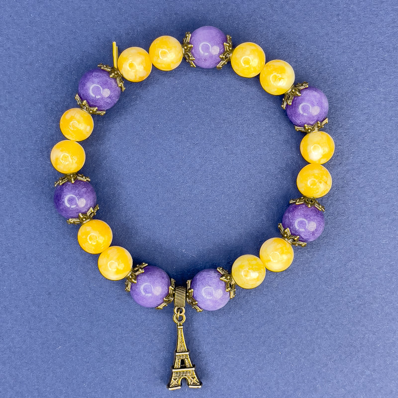 Jadeite bracelet with smooth beads, 8.5 mm diameter ±; Sugilite smooth beads, 10.5 mm diameter ±, length 18 cm ±, stretch