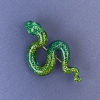 Snake brooch-pendant with green enamel and green crystals on golden metal 30x55mm +