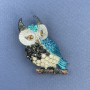 Owl brooch pendant with blue, black and rainbow crystals, enamel, silver-toned metal, diameter 23mm+-, length 50mm+-