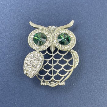 Owl Brooch with green and white rhinestones, silvery metal, diameter 34 mm, length 42 mm