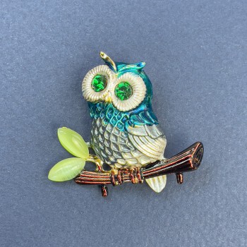 Owl brooch-pendant with green crystals, multicolor enamel, gold-tone metal, diameter 37mm +/-, length 34mm +/-