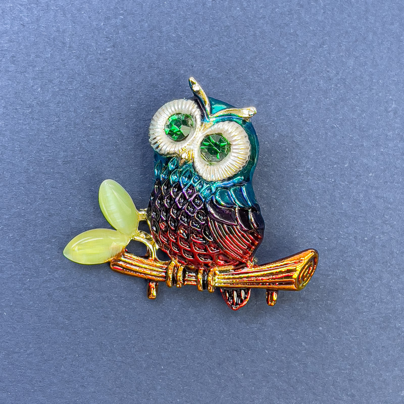 Brooch pendant Owl with green crystals, multicolored enamel on gold-tone metal, diameter 37mm ±, length 34mm ±