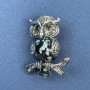 Brooch 'Owl Halite' with gray crystals on a silver-tone metal base, diameter about 26 mm, length 33 mm