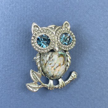 Brooch-pendant Owl Khaliotis blue crystals silvery metal, diameter 25 mm +/-, length 34 mm +/-