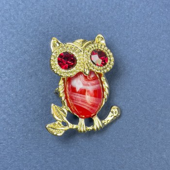 Brooch-pendant 'Owl' with red crystals, golden metal, diameter 25 mm ±, length 34 mm ±