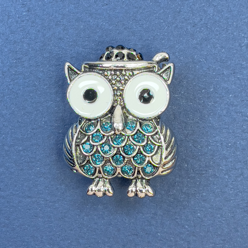 Brooch 'Owl' with White Enamel and Blue Crystals, Silver Metal, diameter 22mm, length 29mm