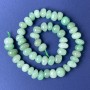 Faceted nephrite beads 10×8 mm on a thread, length 40 cm