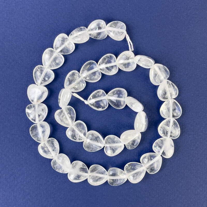 Natural heart-shaped rock crystal beads, 12x12x6 mm, on a thread, length 39 cm