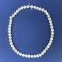 Natural mother-of-pearl beads, smooth round 9mm ± on cord, length 38 cm+