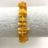 Bracelet of amber crumb, diameter 9–12×2–4 mm ±, with beads, length 18 mm ±, stretch