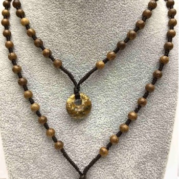Black cord necklace with beads, 6 mm diameter +/-, donut-shaped pendant, 18 mm diameter +/-, length 60 cm +/- (price per piece). Jasper, Agate, Unakite available to choose from