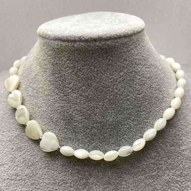 Mother-of-Pearl Grain Choker, diameter 5.5x9 mm, heart 12x12x4 mm, silver-tone metal, length 35-42 cm, with extension chain