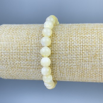 Mother-of-pearl bracelet with a smooth bead, 8 mm diameter ±, 18 mm length ±, stretch