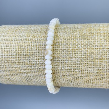 Bracelet with mother-of-pearl rondelles, diameter 5x3 mm, length 18 mm, elastic