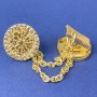 Gold-tone cardigan brooch, 20 mm diameter ±, chain, length 9 cm ±