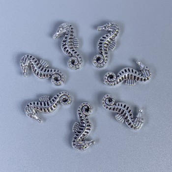 Bead-insert Seahorse Bead, silver metal color, diameter 15x7x3 mm ± hole diameter 1 mm ± packaging 11 pcs