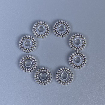 Bead-insert findings in silver metal color, 7×2 mm with approximately 2 mm hole, packaging 20 g (~50 pcs).