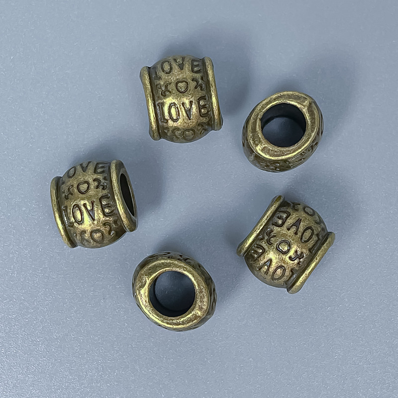 Bronze-colored bead insert finding, 9×10 mm, hole diameter ~5 mm, packaging 10 pcs