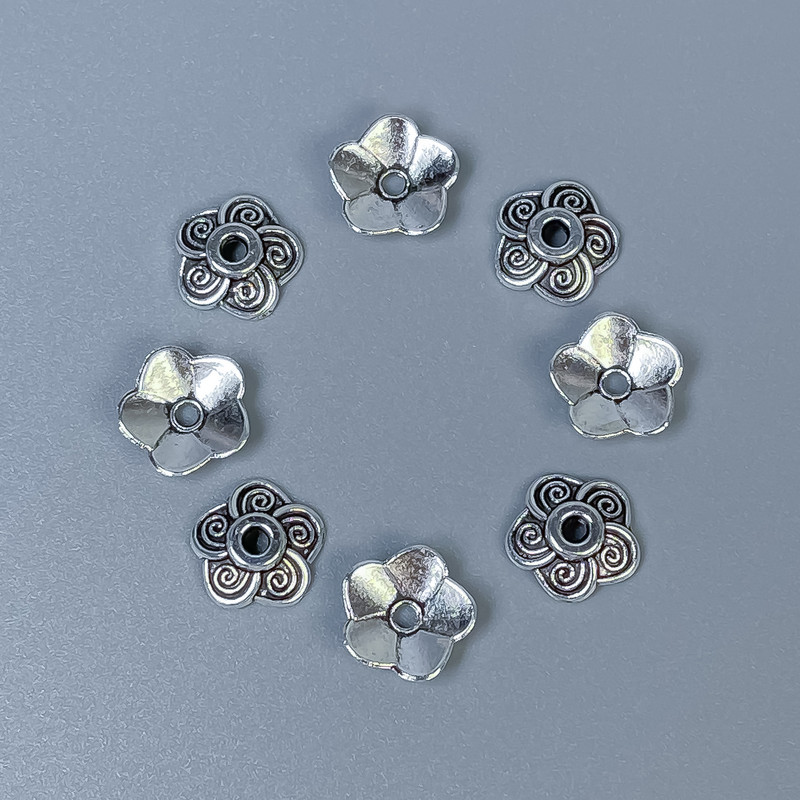 Bead cap findings, silver metal color, diameter 8.5 x 0.5 mm, hole diameter ~1.5 mm, packaging 60 pcs