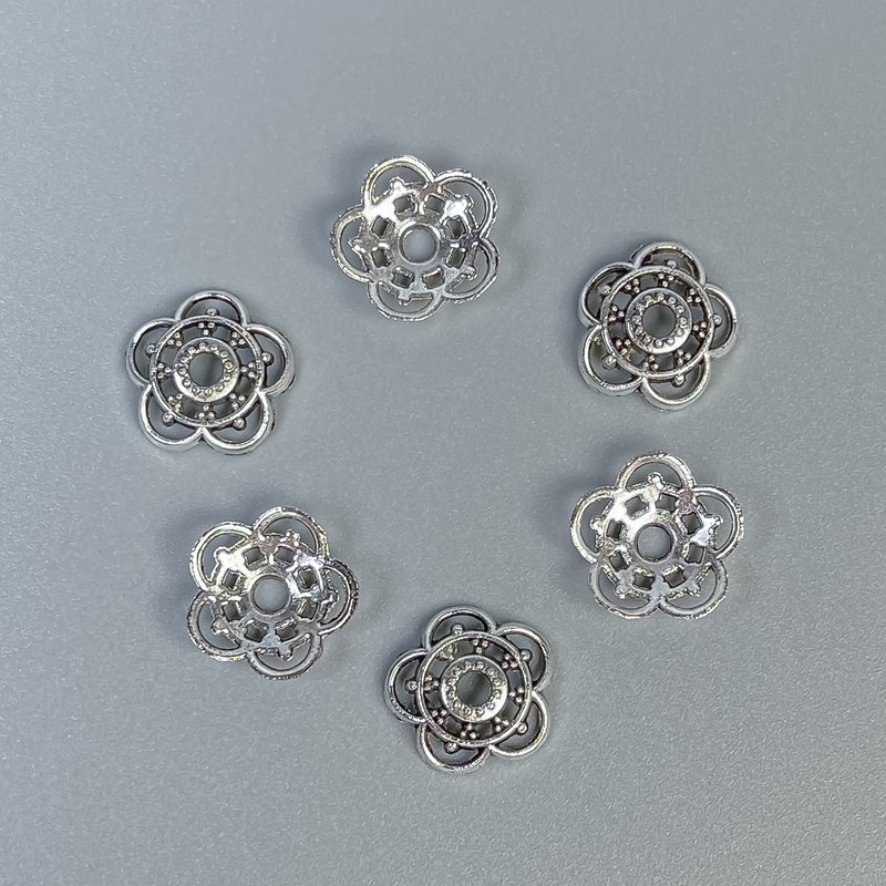 Bead cap findings, silver color, outer diameter 10 x 0.5 mm, hole diameter approx 2 mm, packaging 20 g (~85 pcs)