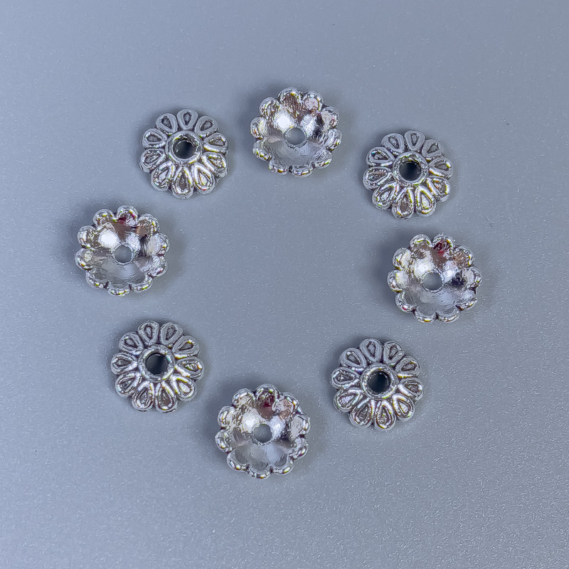 Bead cap findings in silver metal color, 7×1 mm diameter, hole diameter ≈ 1.5 mm, packaging 20 g (≈ 65 pcs)