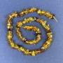 Amber chip beads on thread 39 cm