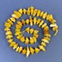 Amber chip beads 9-12×3-5 mm, with 2.5 mm seed beads, on thread, length 39 cm